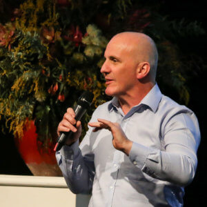 Mike Symonds presenting at a conference