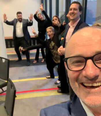 CX Skills trainer delivering a private, in-person course with a team