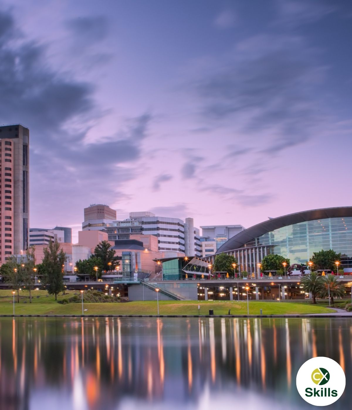 Adelaide Riverbank precinct at dusk with city skyline