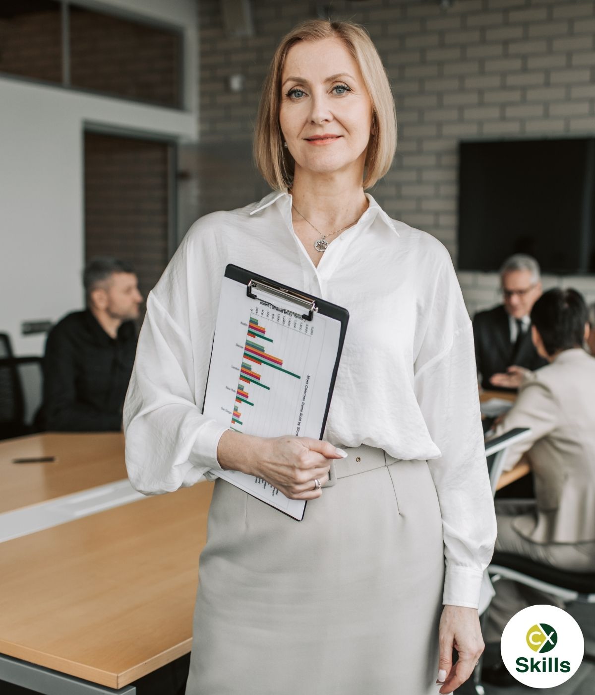 call centre manager holding a quality checklist