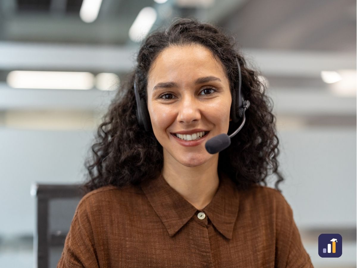 Smiling technical support agent wearing a headset